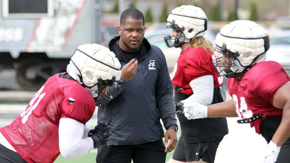 Rahju coaching football